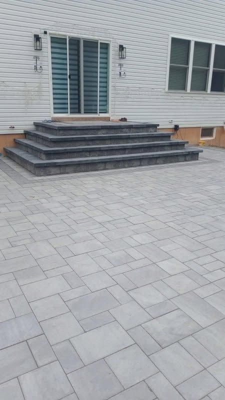 Paver patio with matching stone steps